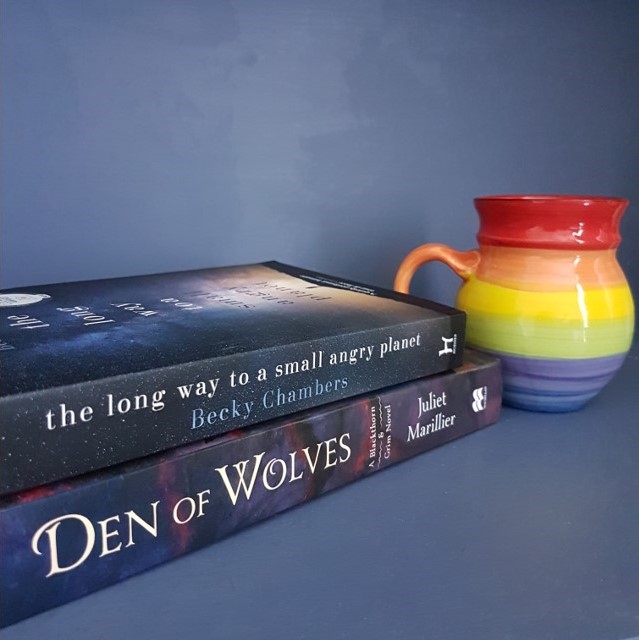 Reading for comfort and defiance, Den of Wolves, Juliet Marillier, The Long Way to a Small Angry Planet, Becky Chambers, The Wayfarers, Blackthorn and Grim, books and tea, tea and books, Earl Grey Editing
